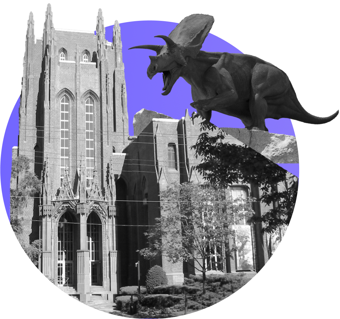 Black and white image of a Gothic-style brick building with a large model of a roaring triceratops dinosaur on the roof against a purple circular background.